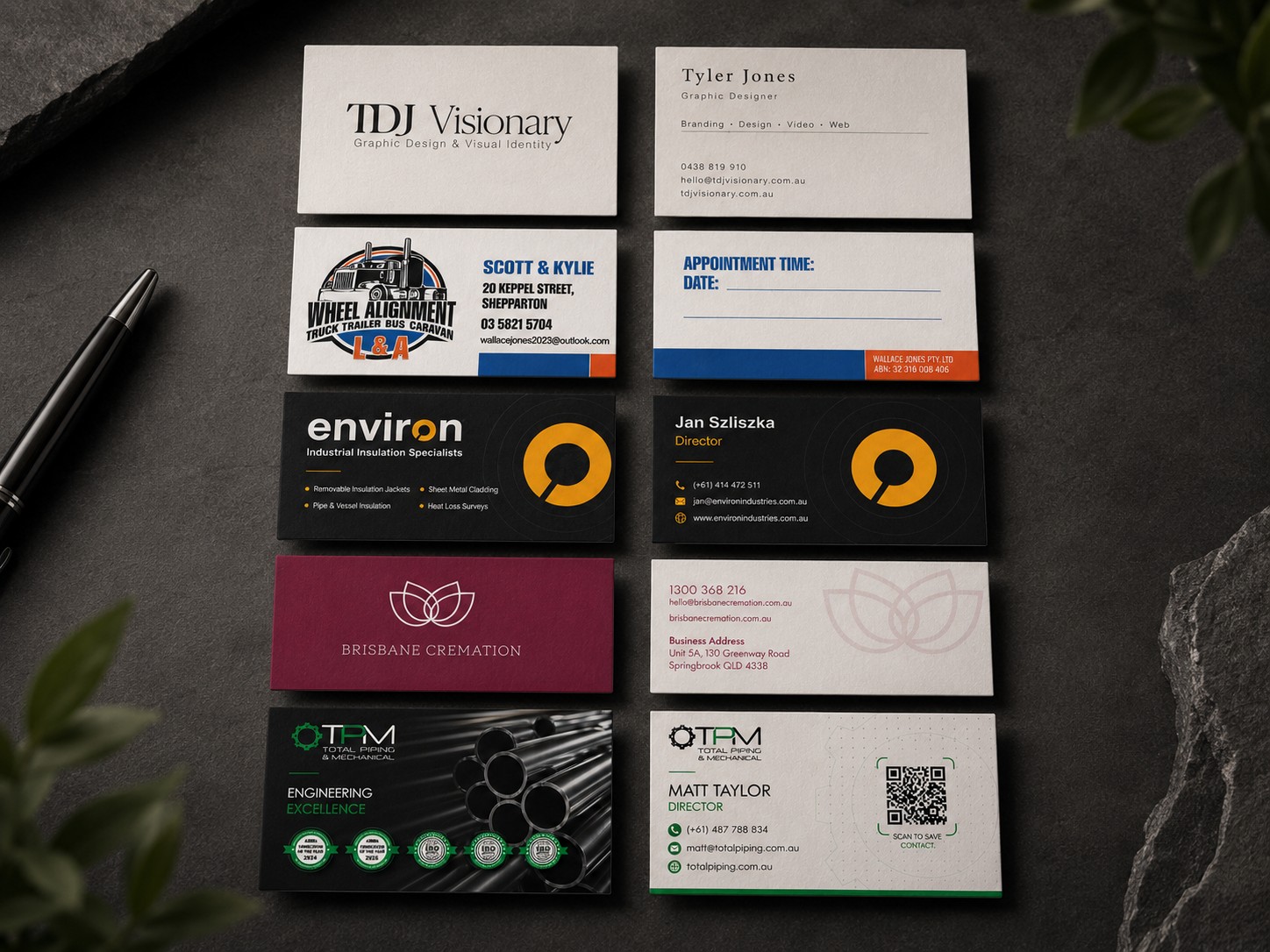 Front and back business card designs for five client brands